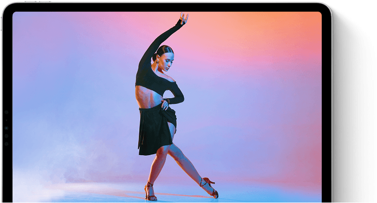 MacBook с изображением танцора, выполняющего па
